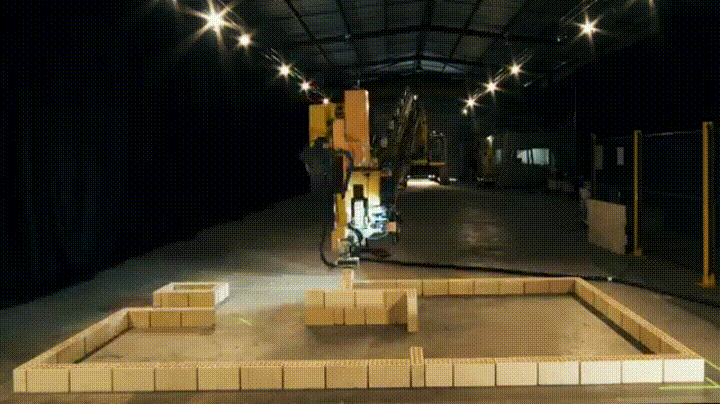 Bricklaying Robot and Caterpillar Construction Team Up